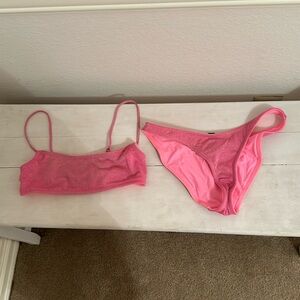 Pink Triangl swimsuit. Size small top and bottom. The color is a little faded
